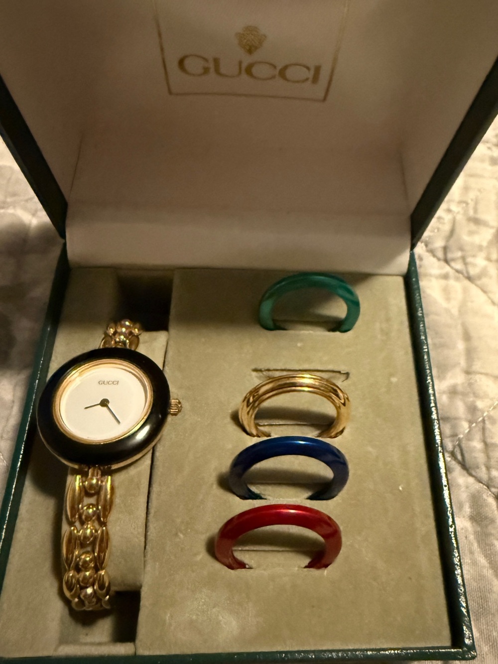 Gucci Gold Bracelet Watch with Interchangeable Bezels